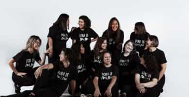 group of people sitting on white floor