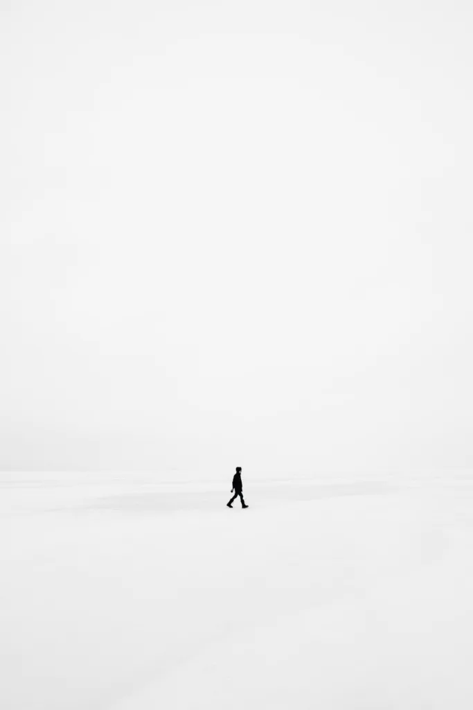 person walking on snowfield