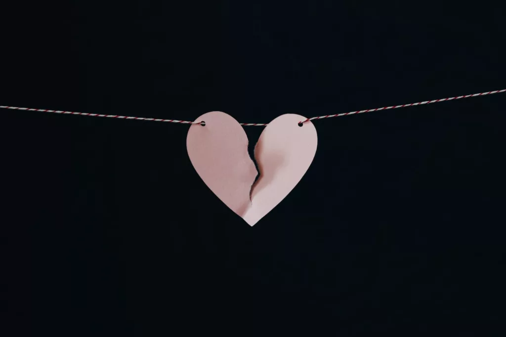 broken heart hanging on wire