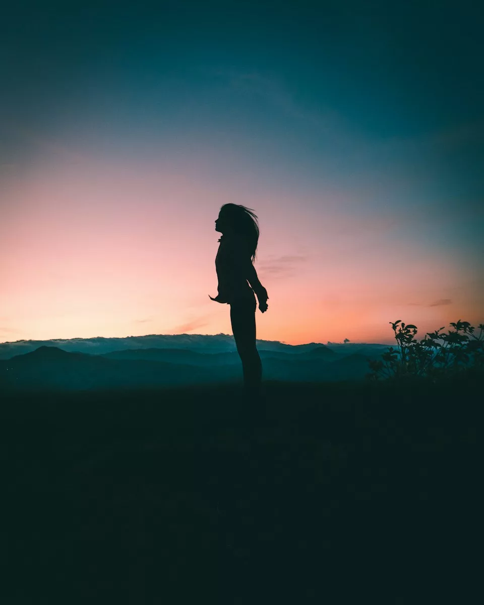 silhouette of woman jumping